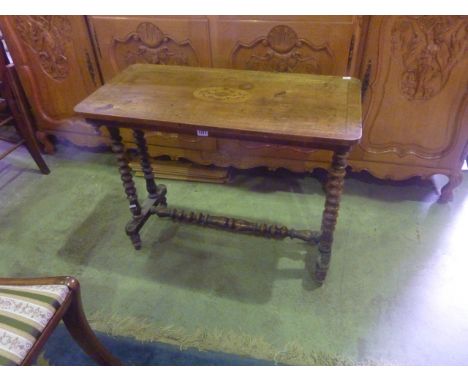 A Victorian walnut and simply marquetry occasional table of rectangular form, raised on four bobbin supports united by a cent