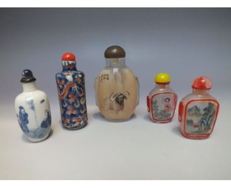 THREE ORIENTAL GLASS REVERSE PAINTED SNUFF BOTTLES, the larger bottle with a water buffalo to one side and an elephant to the