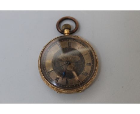 A VICTORIAN OPEN FACED MANUAL WIND FOB WATCH, the highly engraved outer casing with vacant cartouche is stamped 18k internall