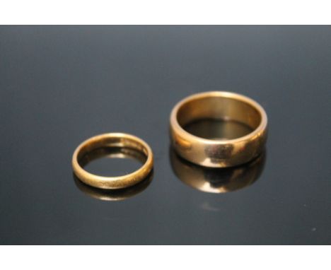 TWO HALLMARKED 22 CARAT GOLD WEDDING BANDS, ring sizes T 1/2 and K approx combined weight 16g