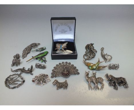 A COLLECTION OF ANIMAL THEMED SILVER AND COSTUME BROOCHES, the majority being silver and marcasite set, including three ename