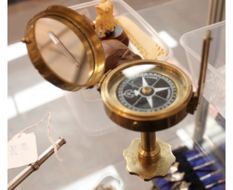 Vintage brass sighting compass, T. Cooke, London and 1919 sailor's cap
