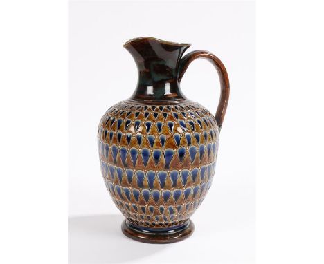 Royal Doulton jug, with loop handle, the bulbous body with brown and blue scale type decoration, on a circular foot, impresse