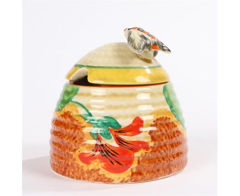 Clarice Cliff Bizarre 'Nasturtium' beehive shape honey pot and cover, with a bee forming the handle above the ribbed decorate