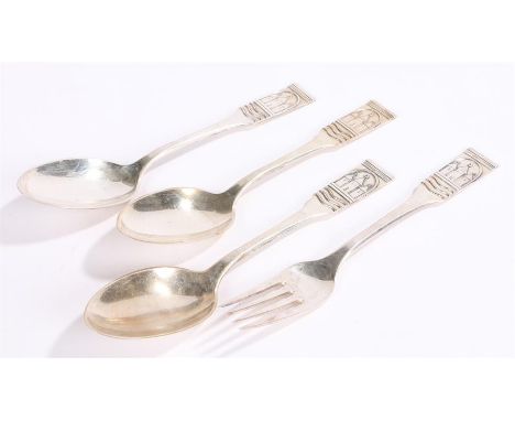 Three Danish silver dessert spoons and a matching dessert fork, two spoons dated 1936, the other 1934, the fork 1939, all wit