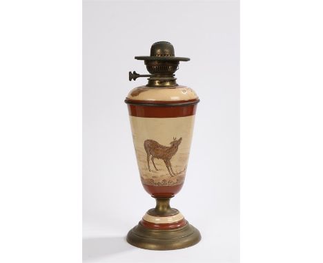 Porcelain and brass oil lamp decorated in the style of Hannah Barlow, the reservoir mount with incised bird and foliate decor