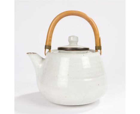 Lucie Rie  (1902 - 1995) stoneware teapot, the domed body with all-over white glaze, the lid with a manganese edge, looping c