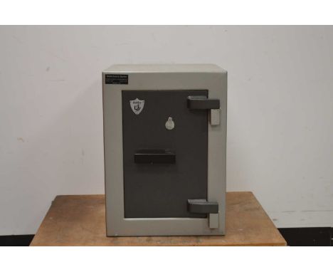 SALEROOM ANNOUNCEMENT - Keys are presentA Dudley safe, a key lock system with a removable and adjustable shelf, a large secur