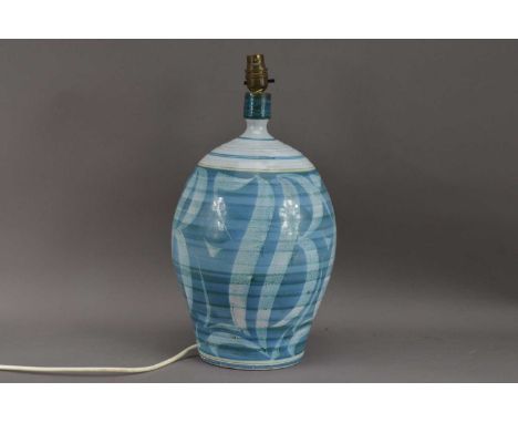 An Aldermaston pottery earthenware lamp, blue and white baluster body, incised 'J' to the underside, will require re-wiring, 
