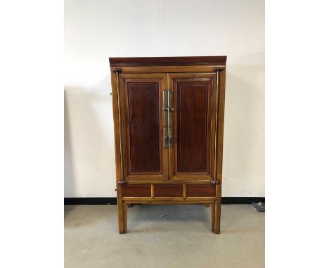 A modern Chinese hardwood wardrobe, one door with basic restoration, metal lock, with a shelf inside with a frieze drawer, on