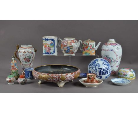 An assorted collection of Chinese ceramics, including vases, the tallest 27cm high, two teapots, a large footed dish 31cm in 