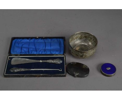 A assorted collection of silver and white metal items, including a Victorian white metal and tortoise shell eye glass 7.5cm w