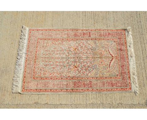A Turkish woollen carpet, tree of life, 134cm x 89cm