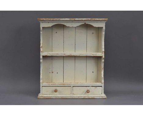 A painted wooden spice rack, white painted in worn condition, two shelves, over two drawers, 41cm H x 35cm W