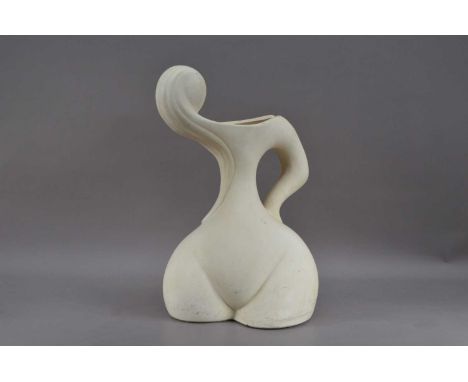 A modern ceramic stylised sculpture, appears to be of the female form, cream in colour, 48cm high