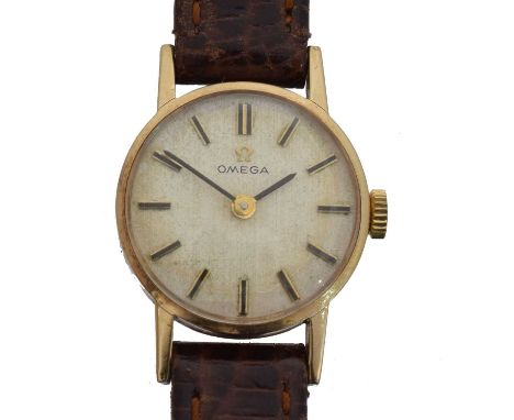 A 1970s 9ct gold Omega manual wind wristwatch, ref. 511.5002. The signed silvered dial with baton markers, signed cal. 625 ma