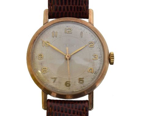 A 1950s 9ct gold Tudor manual wind wristwatch, ref. 6526. The previously signed dial with arabic markers, signed 15 jewel man