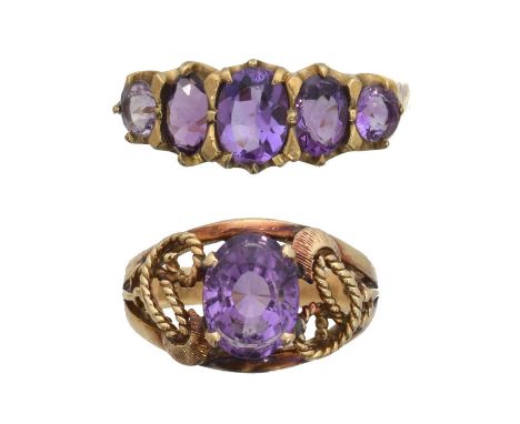Two amethyst dress rings. To include an amethyst five stone ring stamped 9ct, together with an amethyst single stone ring, st