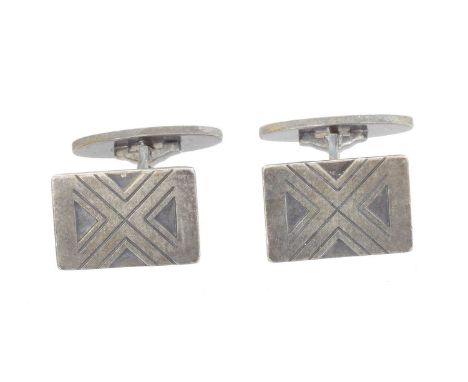 A pair of silver Georg Jensen cufflinks, no. 72. Of rectangular form, with engraved motif, maker's marks, stamped Sterling De
