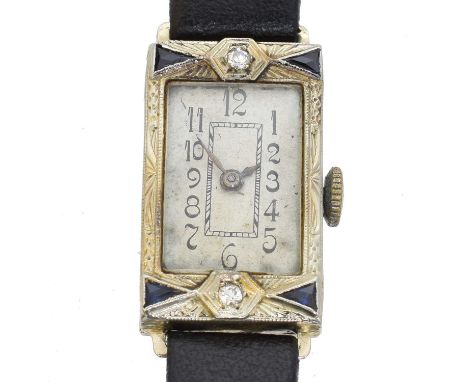 A gem-set cocktail watch. The rectangular dial with Arabic markers and inner chapter ring, 15 jewel manual wind movement sign