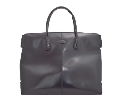 A Tod's 'D Bag' handbag. The black patent leather exterior with embossed maker's logo, black canvas interior and silver tone 