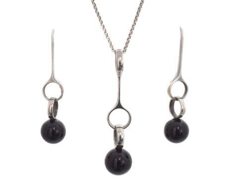 A set of silver onyx 'Sphere' jewellery by Georg Jensen. Designed by Regitze Overgaard for Georg Jensen, comprising a pendant