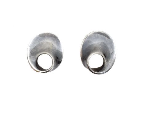 A pair of Georg Jensen 'Möbius' earrings, no. 142. Designed by Vivianna Torun Bülow-Hübe for Georg Jensen, signed Torun, make