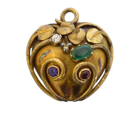 A Victorian acrostic heart locket. Spelling DEAR, set with a diamond, amethyst, emerald and ruby atop the polished heart with
