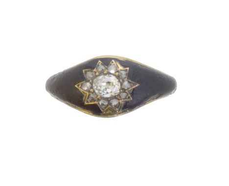 A late Victorian enamel and diamond dress ring. The old cut diamond cluster star-set to the blue-black enamelled band, ring s