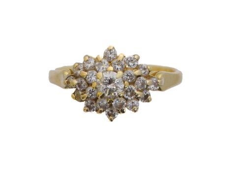 A diamond cluster ring. The brilliant cut diamond within a similarly cut diamond tiered surround, estimated total diamond wei