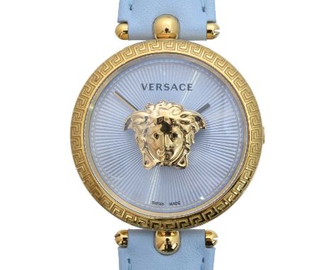 A Versace 'La Medusa' quartz wristwatch. The signed pale blue starburst dial with Medusa head to centre, quartz movement with
