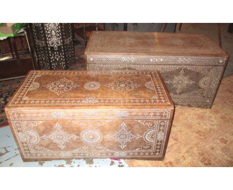 TRUNKS, a set of two, Moorish hardwood and mother of pearl inlaid each with rising lid, 49cm H x 102cm x 47cm and 41cm H x 86