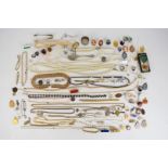 A collection of jewellery including two pearl necklaces, four silver rings, silver pendant and