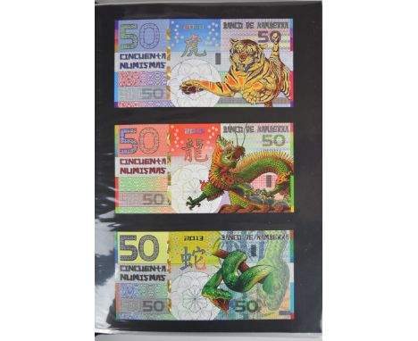 Collection of approximately 220 world banknotes in an album, including Russia, Mongolia, Madagascar, Namibia, Uganda, The Gam