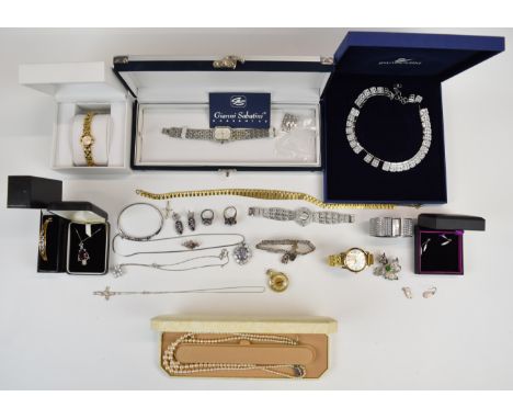 A collection of jewellery including Swarovski necklace, silver bangle, two silver necklaces, rolled gold bangle, two silver r