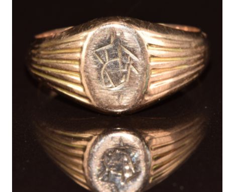 A yellow metal signet ring marked 333, 1.7g, size R
