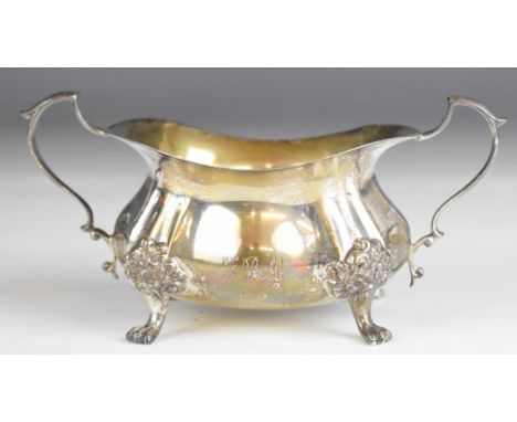 Poole sterling American silver twin handled sugar bowl raised on four lions paw feet, length 15.5cm, weight 160g