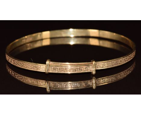A 9ct gold adjustable bangle with Greek key decoration, 6g