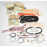 A collection of jewellery including silver bracelet and matching earrings set with abalone, two