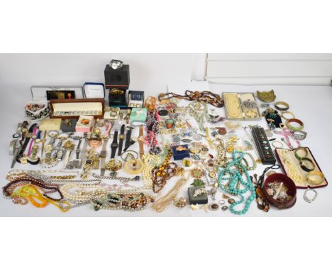 A collection of jewellery including vintage beads, bangles, watches and brooches including Sarah Coventry, jet, Exquisite, Ho