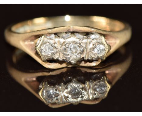 A 9ct gold ring set with three diamonds, 2.1g, size K