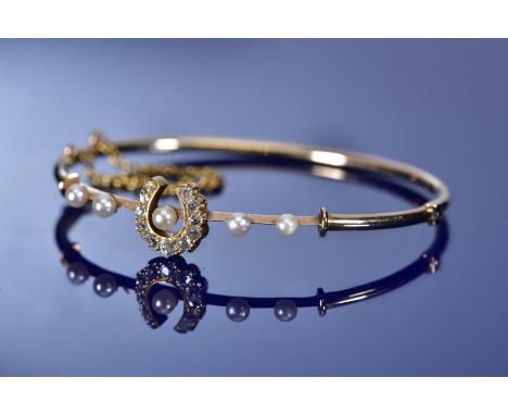 Victorian yellow metal bangle set with old cut diamonds and natural pearls in the form of a horseshoe, 7.7g, 5.6 x 5cm