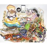 A collection of jewellery including ten silver rings, two 9ct gold rings (3g), beaded necklaces,