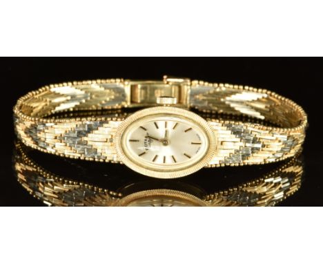 Rotary 9ct gold ladies wristwatch with two-tone hands and hour markers, silver dial and signed movement, on integral 9ct gold