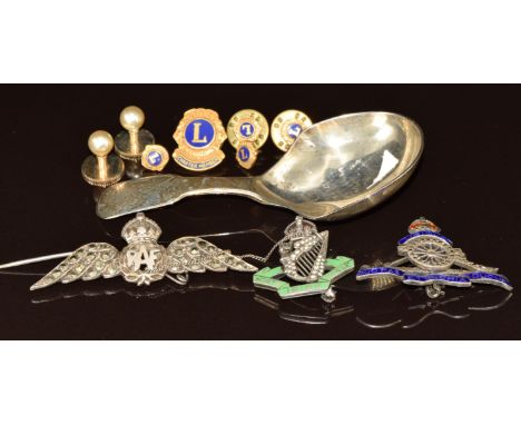 A silver caddy spoon, silver 'North Irish Horse' brooch set with enamel and paste, silver RAF brooch and silver Royal Artille