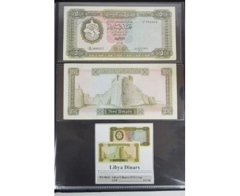 Collection of approximately 170 banknotes from the Middle East and North Africa in an album, including Oman, Tunisia, United 