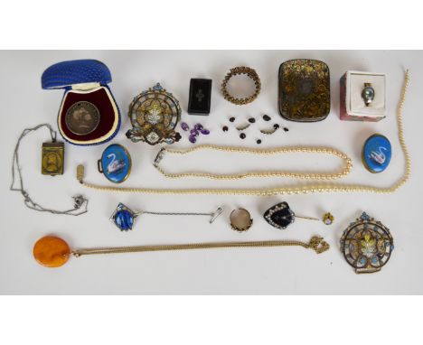 A collection of jewellery including Czech buckle set with enamel, silver ring set with topaz, 1819 silver coin, loose garnets