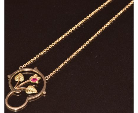A 9ct gold c1915 necklace set with a synthetic ruby and foliate design, 4.9g, 47cm