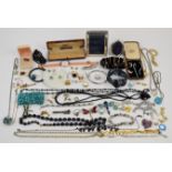 A collection of jewellery including turquoise bracelet, silver Avon ring, silver brooch, two