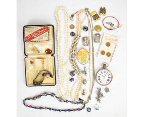 A collection of jewellery including yellow metal bangle (4.4g), two French paste buckles, three silver clips, millefiori glas